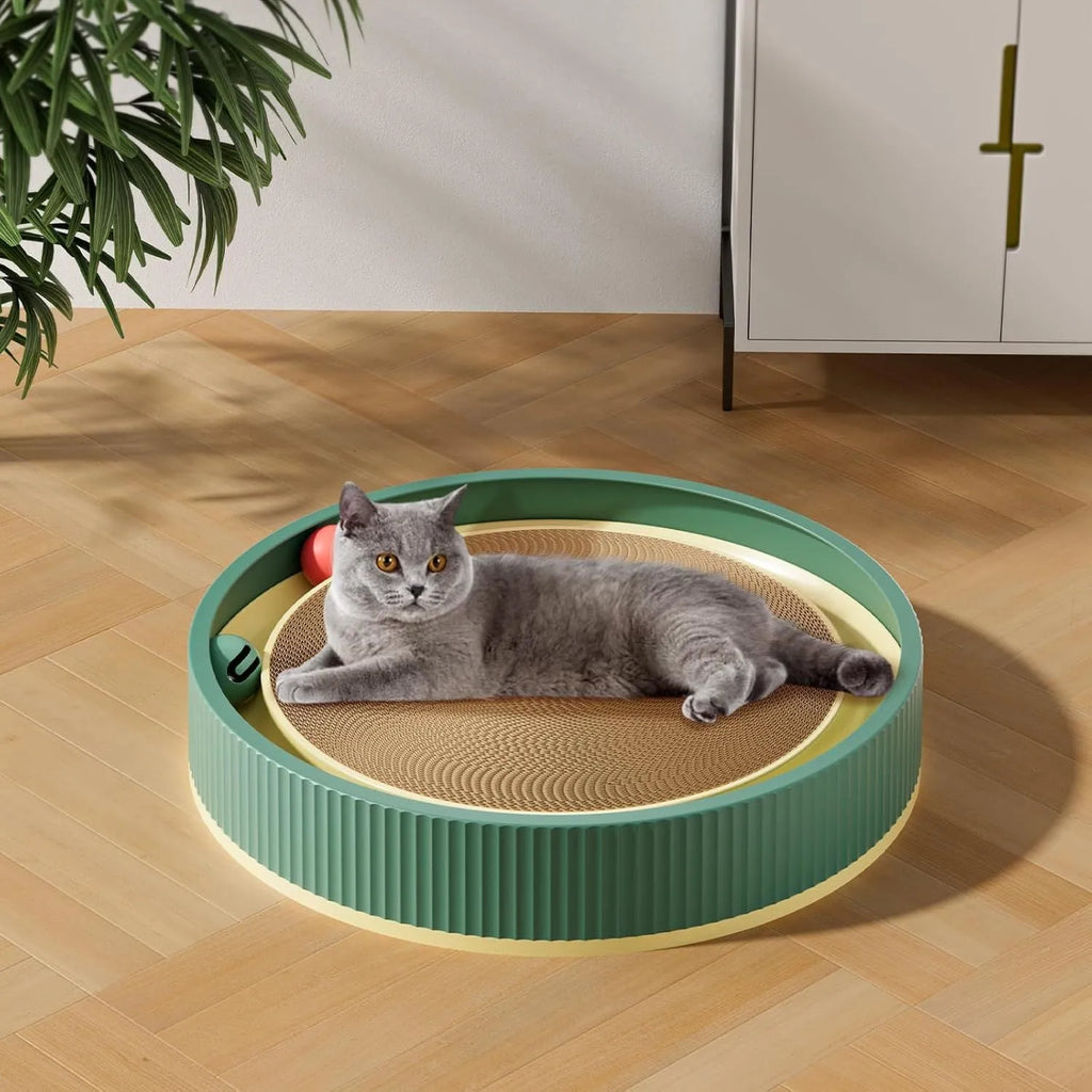 Large circular cardboard cat scratching board with integrated ball toys and replaceable core
