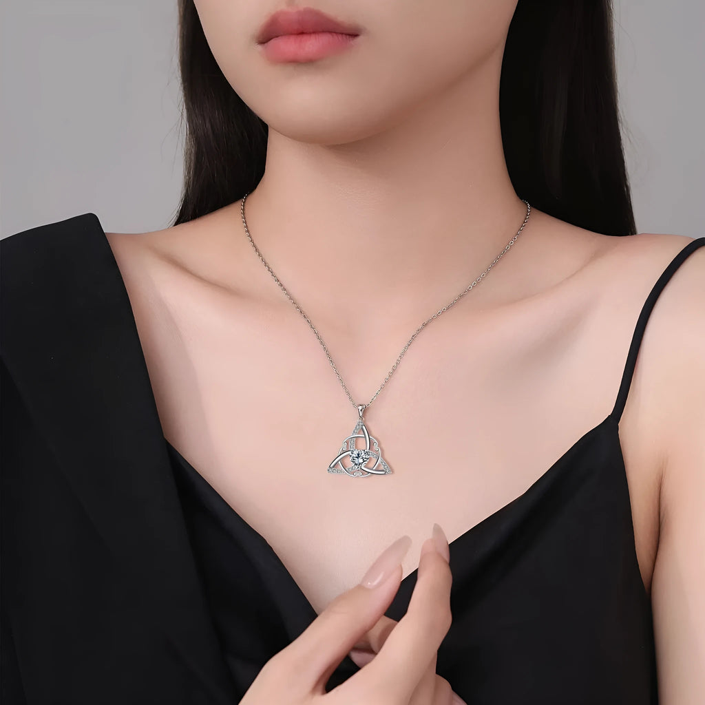 A geometric Celtic knot pendant necklace for women in an electroplated finish.