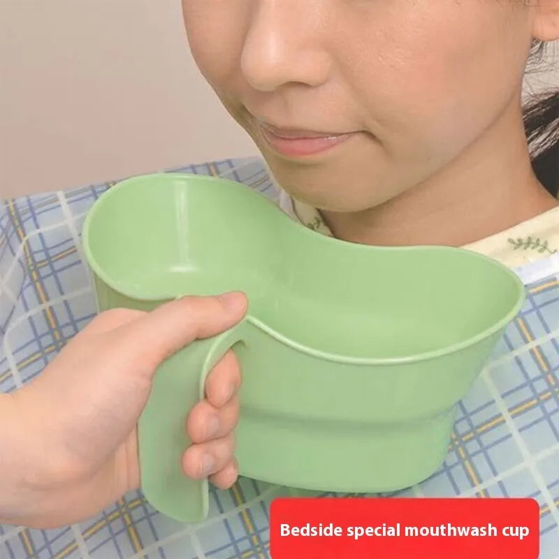 Green plastic gargle cup for bedridden elderly patient nursing care and oral hygiene