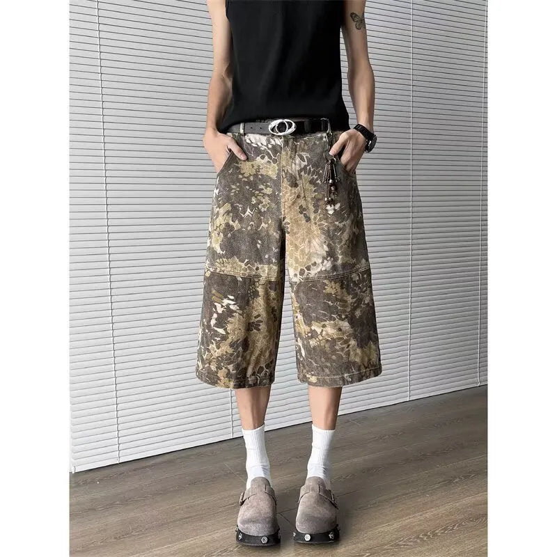 Yellow cotton denim cropped jeans with a snake camouflage pattern print.