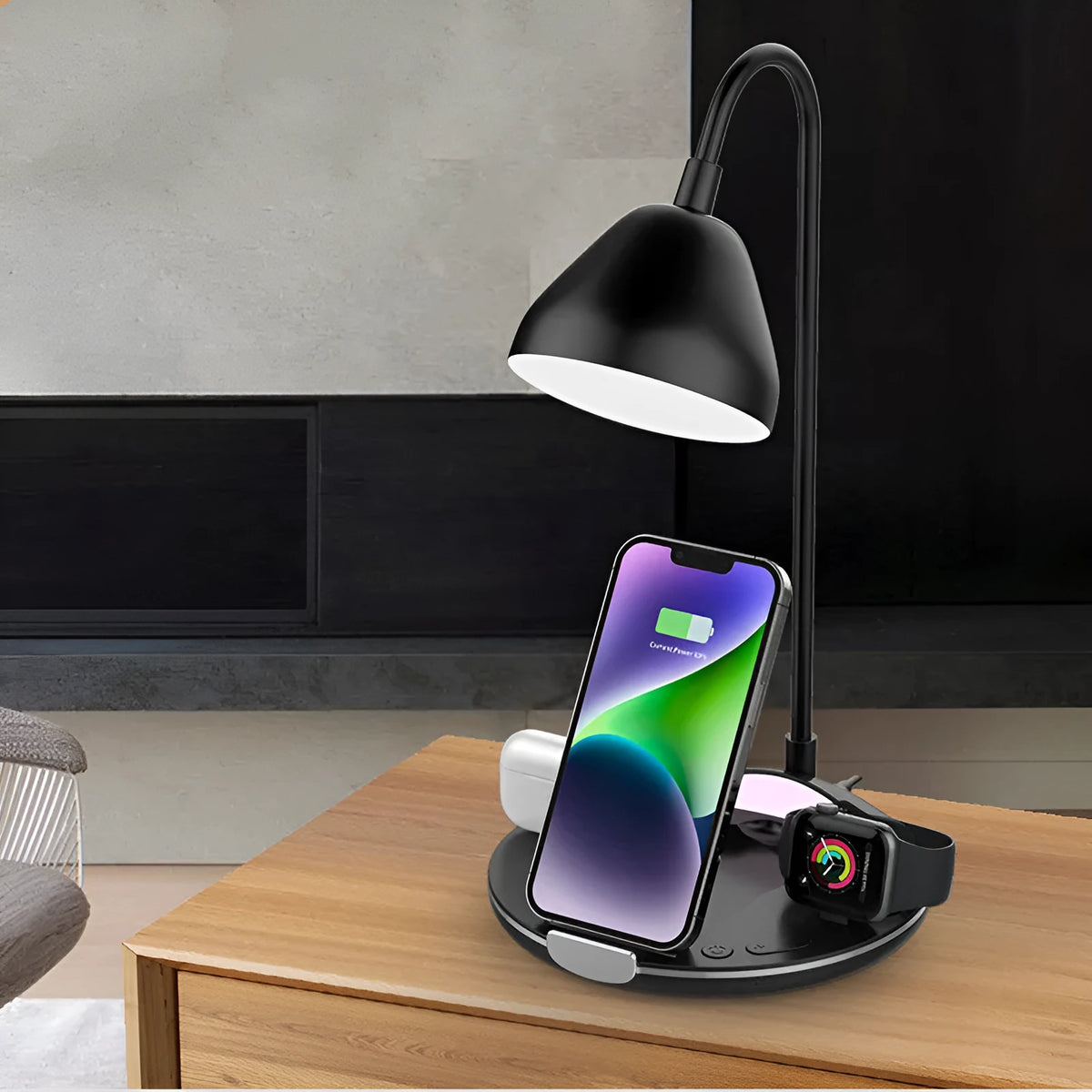 Black folding wireless charger showing magnetic phone attachment and built-in cable storage compartment