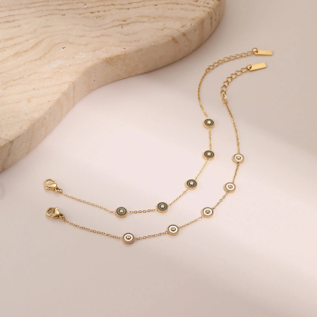 Women's geometric fritillary design bracelet and necklace set with 18K gold plating on stainless steel