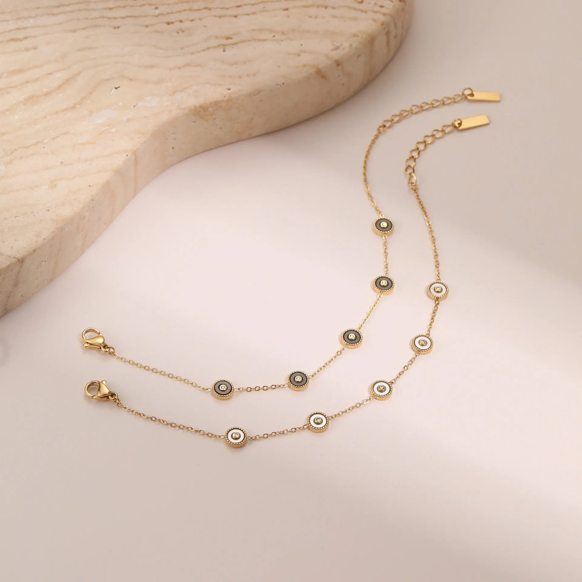 Women's geometric fritillary design bracelet and necklace set with 18K gold plating on stainless steel