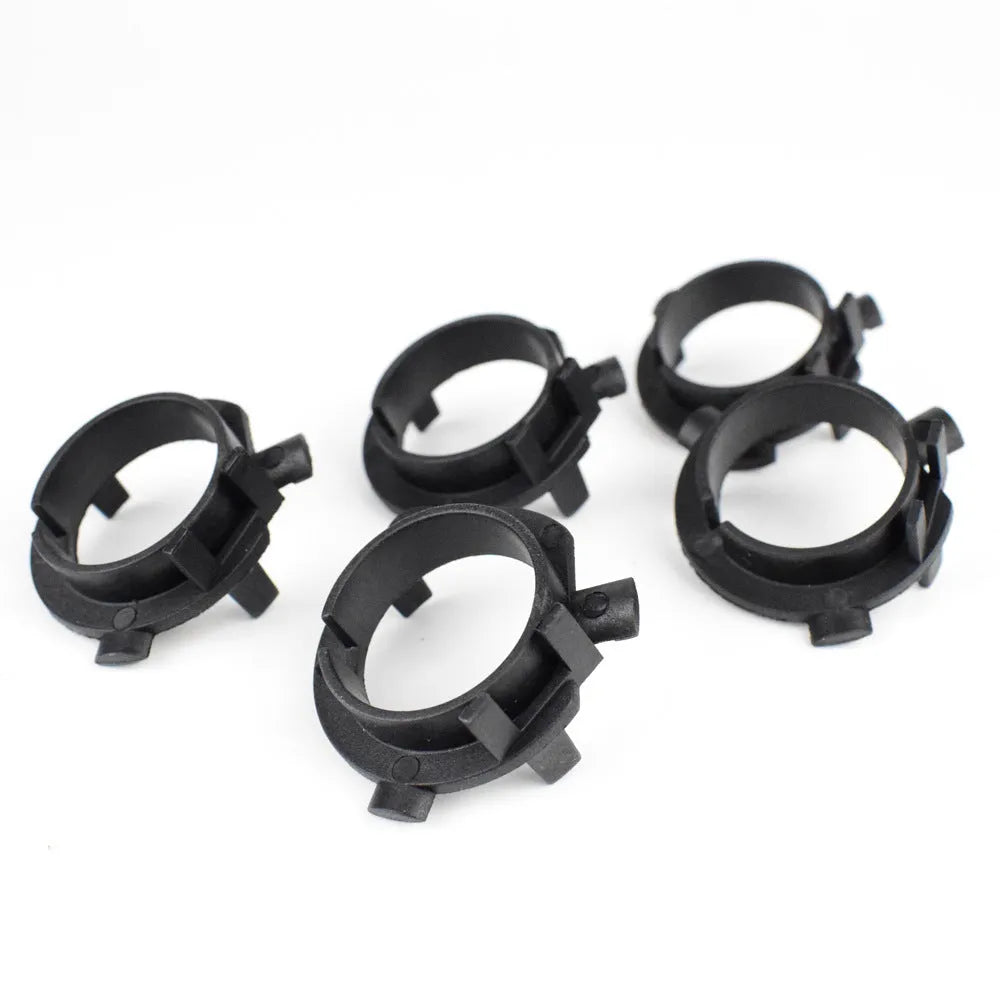 White ABS plastic car LED headlight card holder with dimensions 3.8cm by 3.7cm.