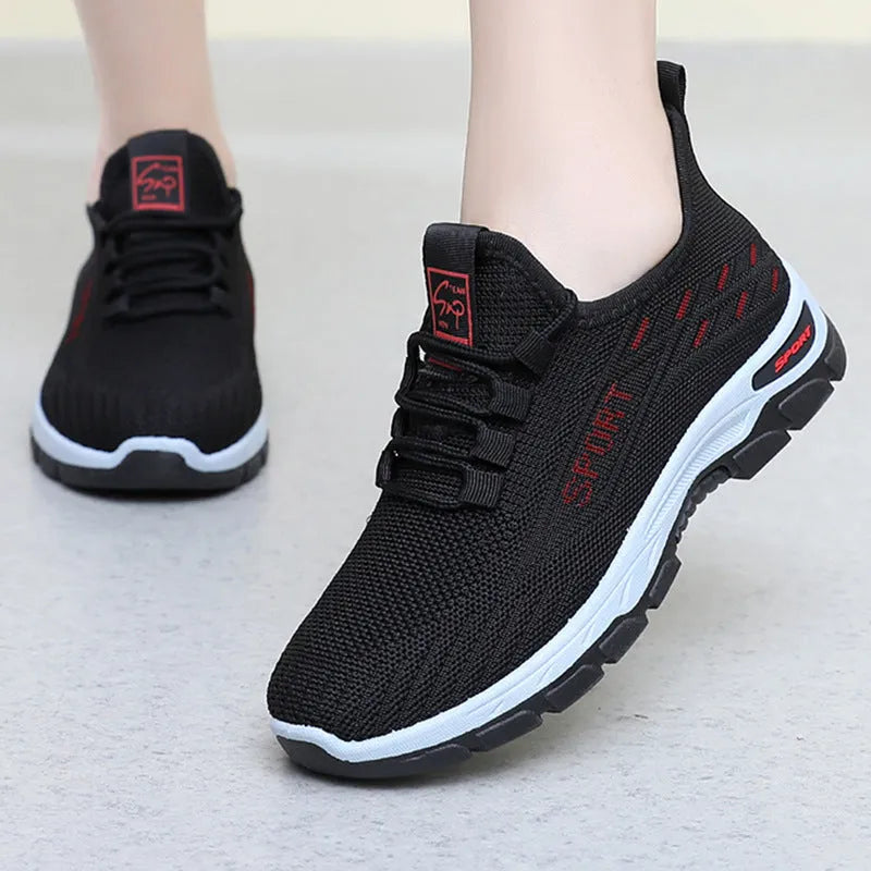 Low-top casual sneakers with a round toe and PVC sole, shown in available colours for men and women.