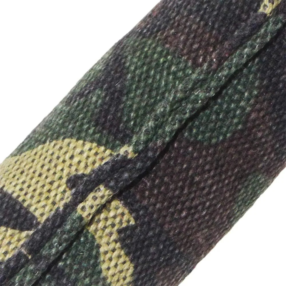 Beige woven jute dog tug toy with two fabric handles on a grey background.