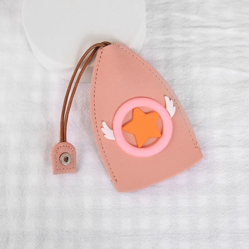 Colourful cartoon pull-out key case made from PU leather, showing the key extended from its protective sleeve.