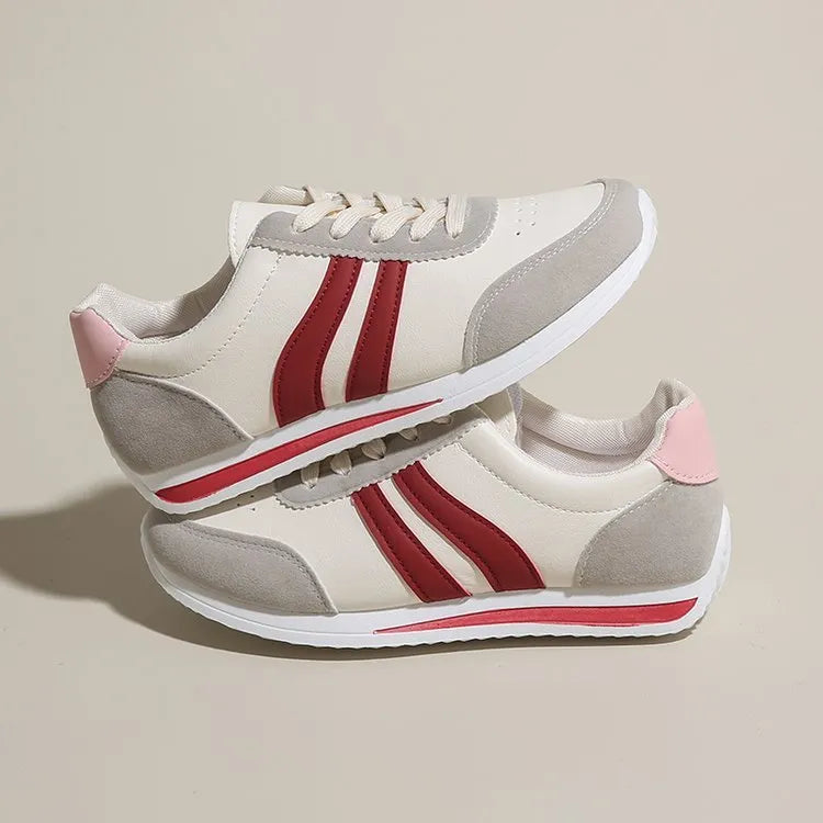 Low-top lace-up running sneakers in blue with mesh upper and rubber sole