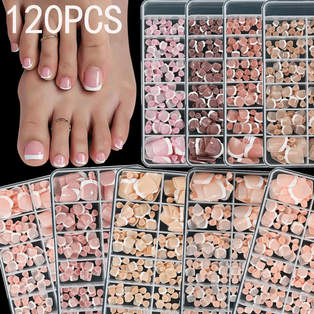 Box of 120 French white edge nude full square short artificial nail pieces showing nine colour shades