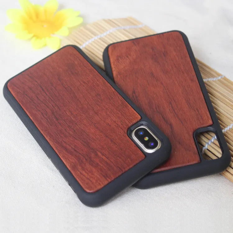 Wooden bamboo and TPU hybrid protective case for iPhone on a table.