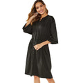 A-line midi dress with elastic waist, long sleeves, and a cinched belt in black and red colour options