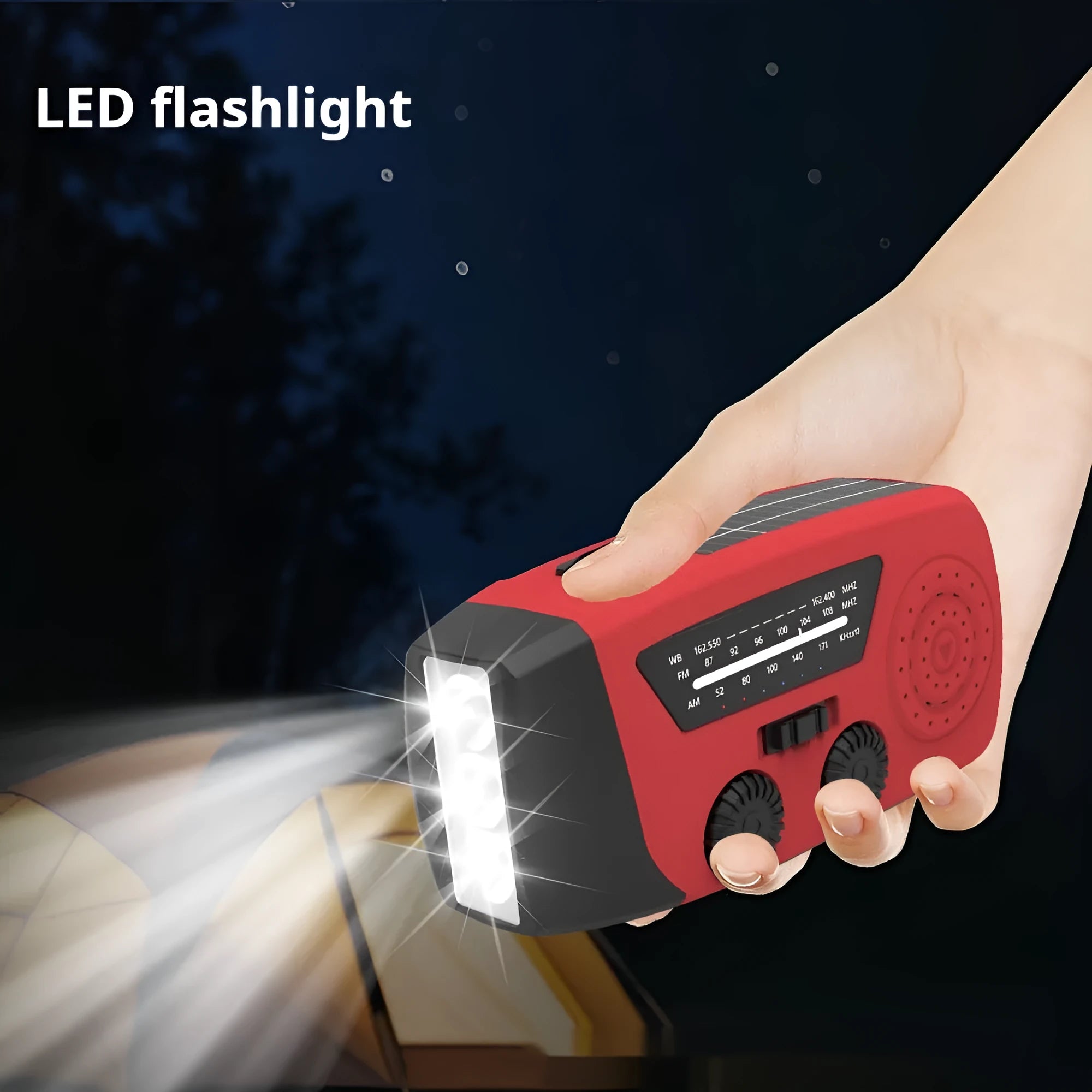 Red rechargeable emergency radio torch with hand crank, LED light, and USB charging port