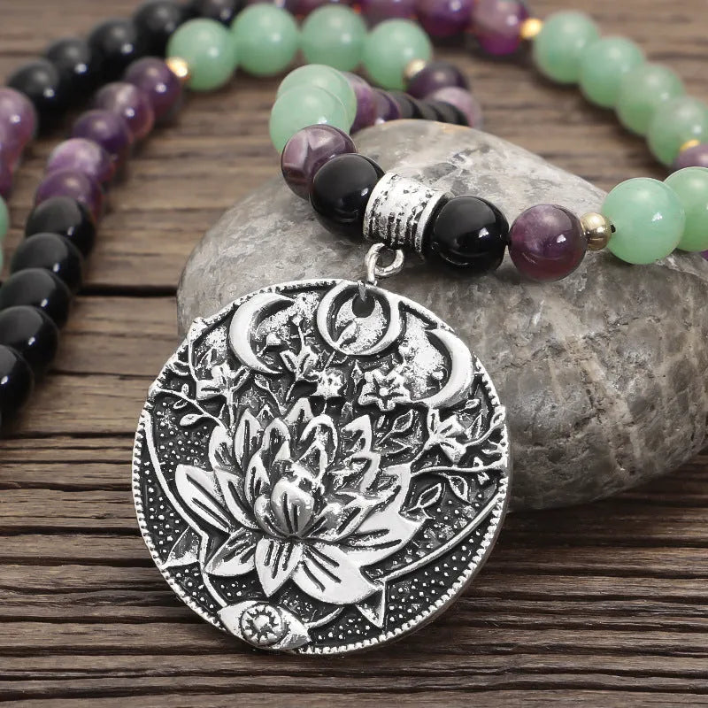 Dongling Long handmade stone bead necklace with alloy lotus pendant and matching bracelet, adjustable length.