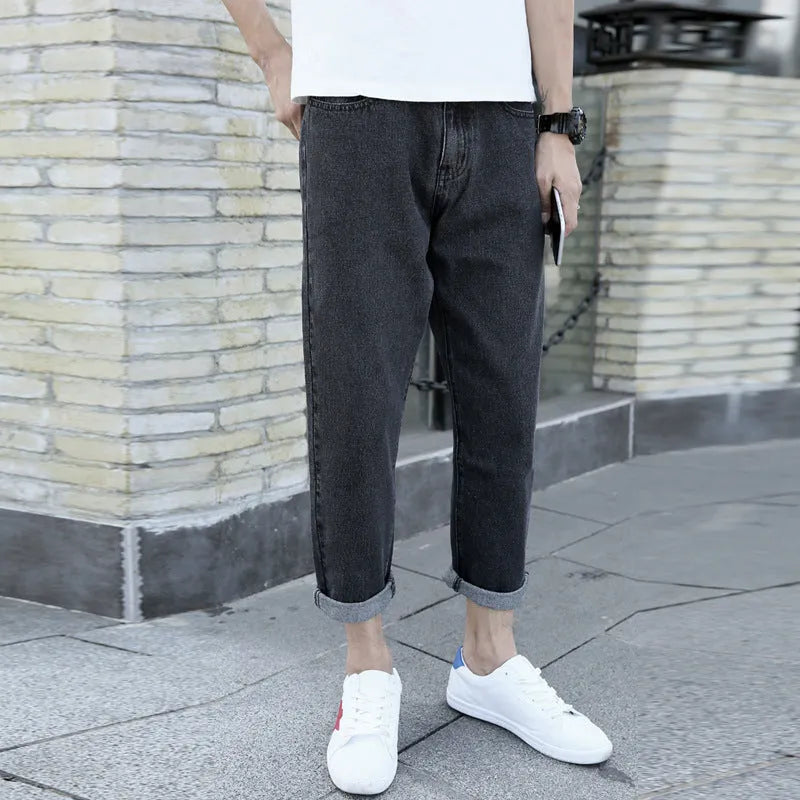 Men's black straight leg jeans with loose harem style and light straight leg opening