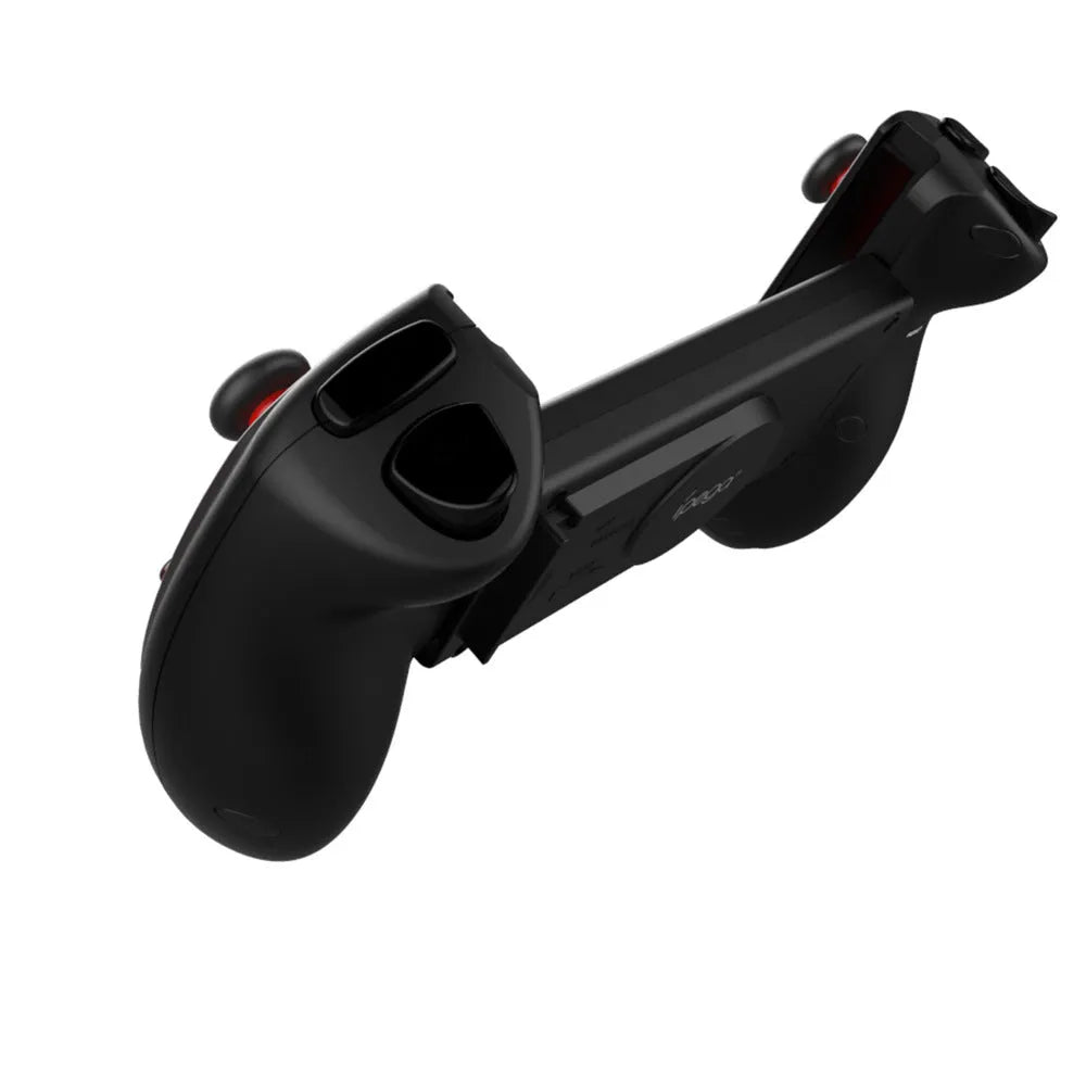 Red telescopic Bluetooth gamepad controller extended with a phone inserted, showing USB cable.