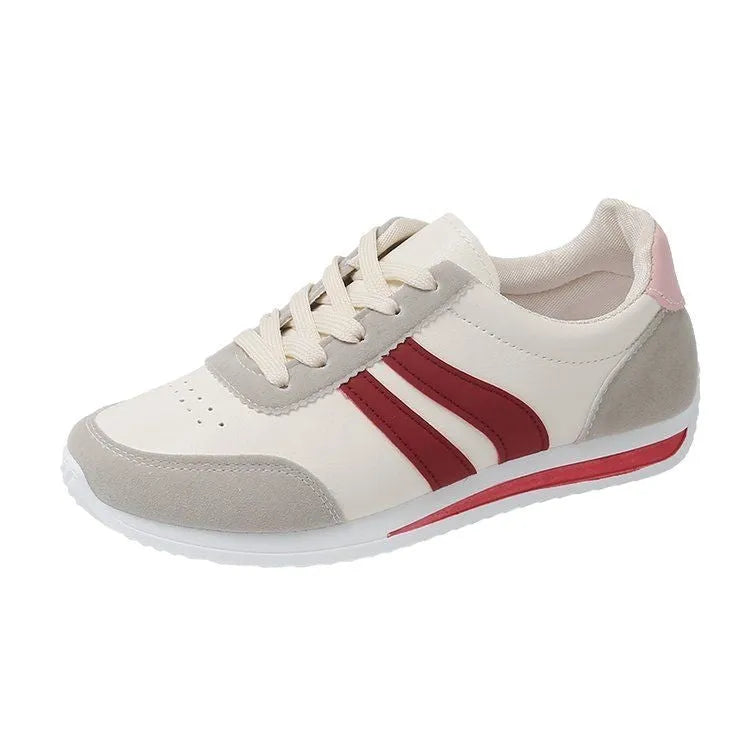 Low-top lace-up running sneakers in blue with mesh upper and rubber sole