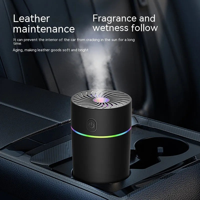 Compact black car USB humidifier with aromatherapy function on a dashboard