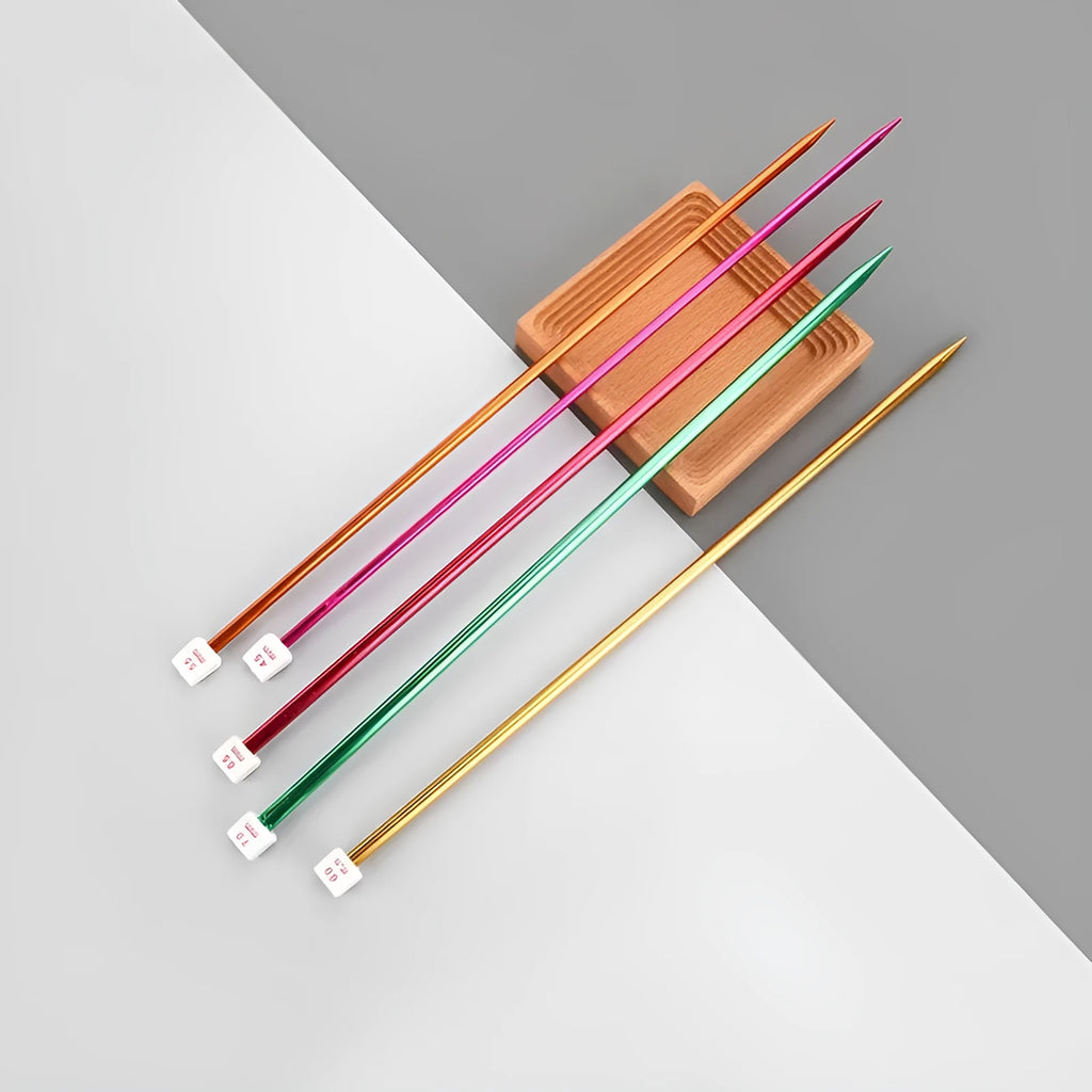 Set of lengthened double-ended crochet hooks in various sizes from 2.0mm to 10.0mm with protective end caps.