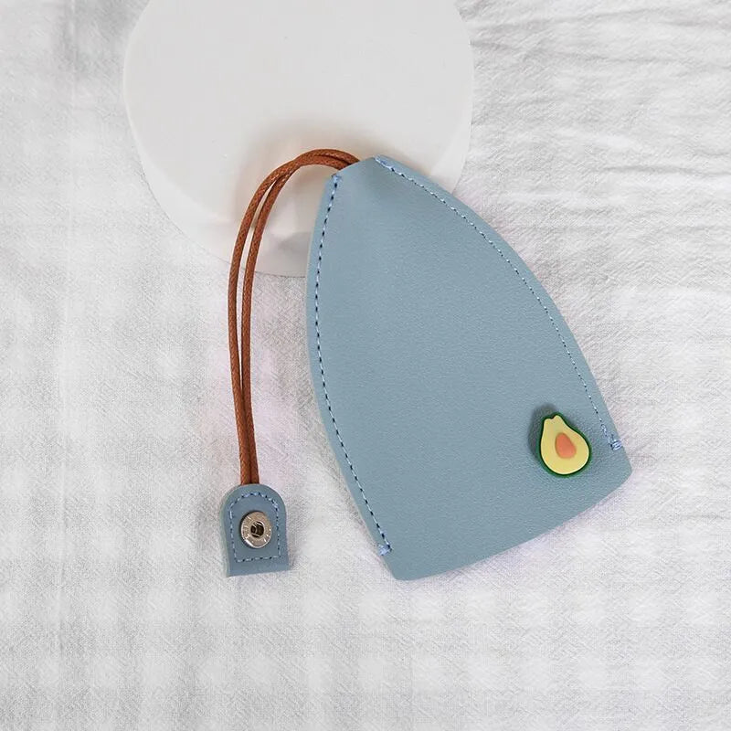 Colourful cartoon pull-out key case made from PU leather, showing the key extended from its protective sleeve.