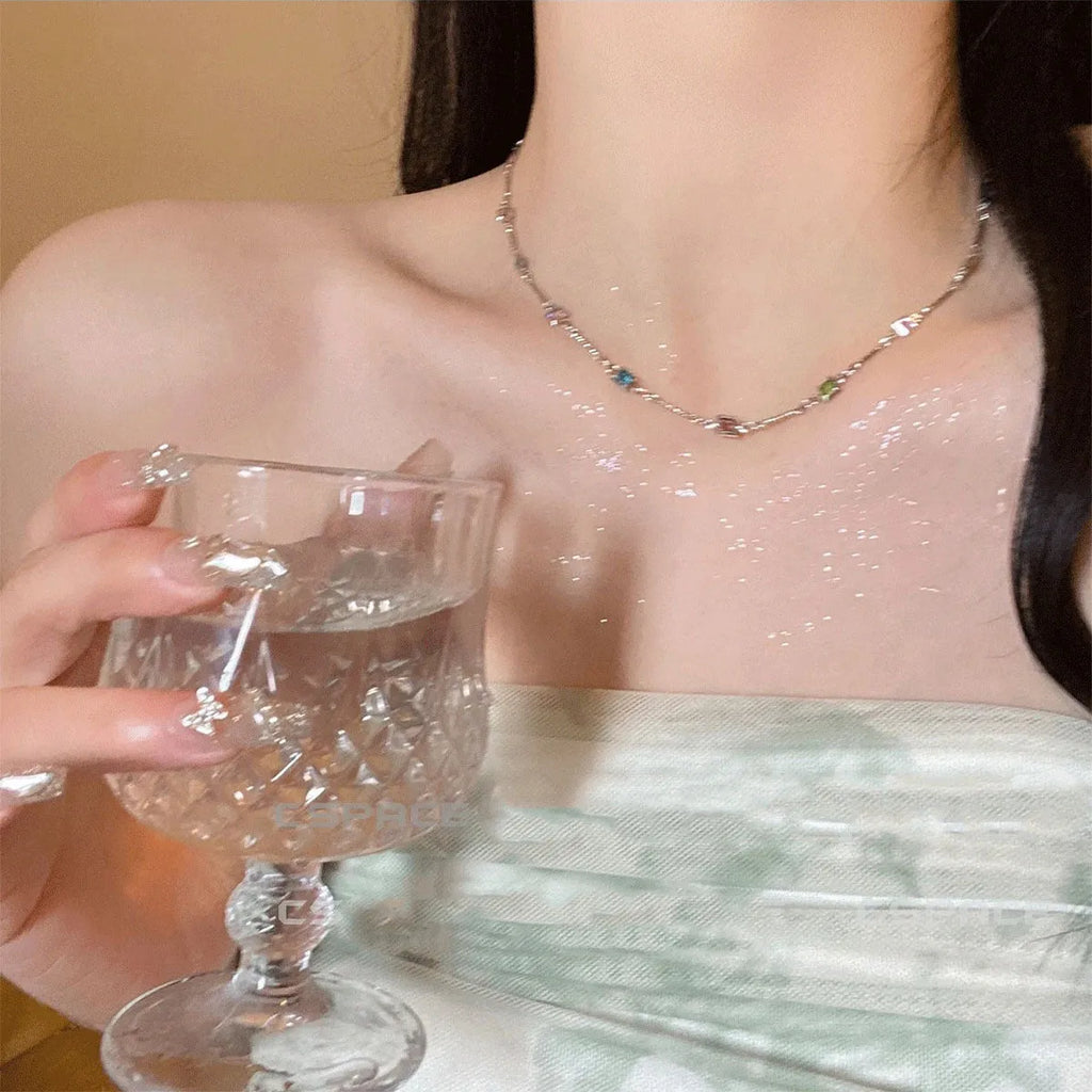 Square geometric clavicle chain necklace in gold or white K tone with alloy and artificial crystal.