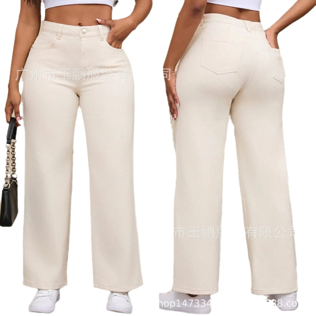 Women's high-waisted straight leg wide jeans in apricot colour on a hanger.