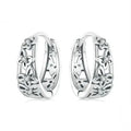 Sterling silver hollow butterfly earrings with zircon accents measuring 14mm by 5mm