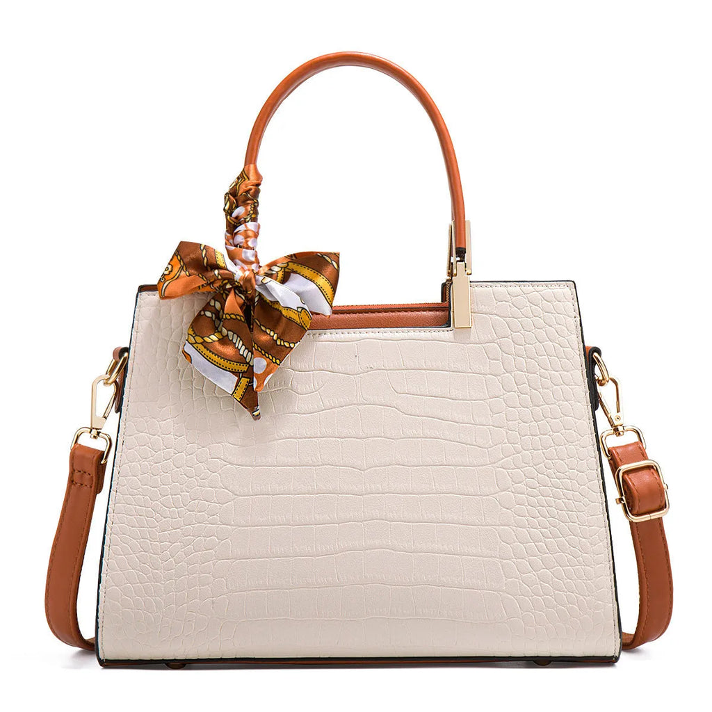 Milky white women's large-capacity PU shoulder handbag with multiple internal compartments and an external slit pocket.