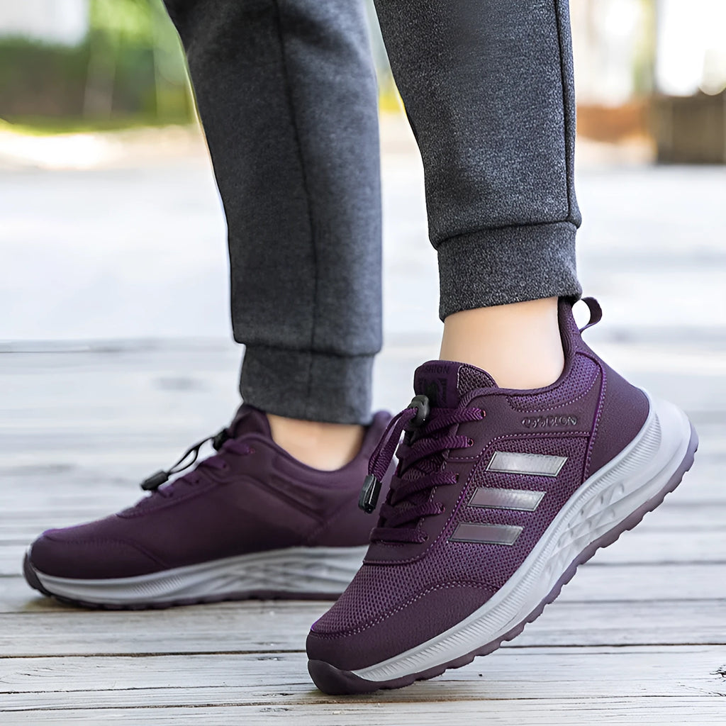Breathable mesh slip-on casual shoes for men and women with elastic band.