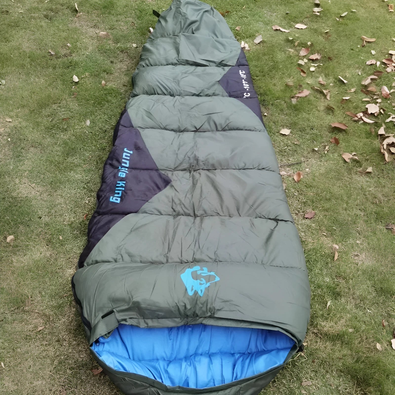 Cotton camping sleeping bag with compression sack in Army Green colour.