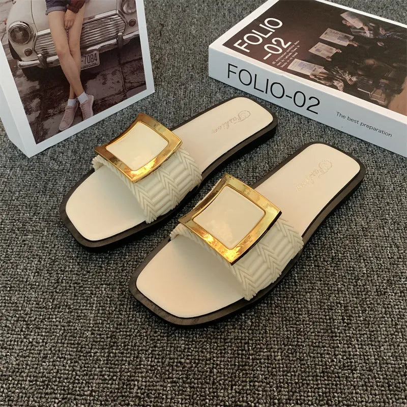 Women's flat summer slippers in apricot colour with PVC sole showing casual design