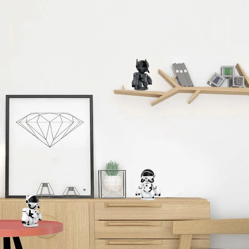 White wireless indoor security camera with a detachable base on a table.