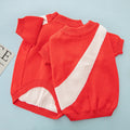 A casual wool knit sweater for a corgi or poodle, shown in one of six available colours.
