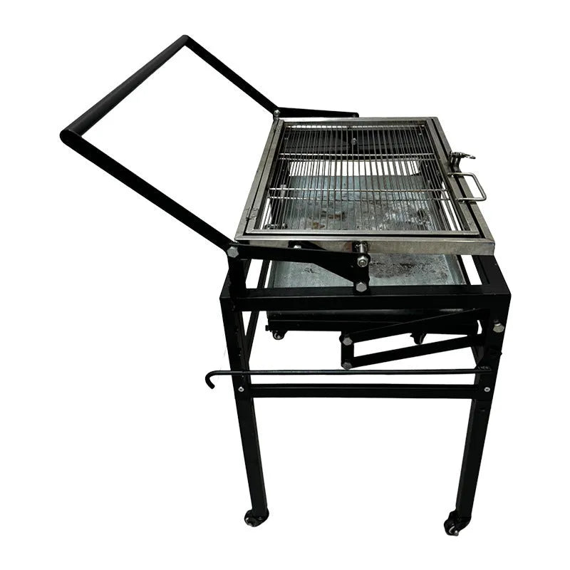 Large portable foldable charcoal barbecue grill stove shown in a garden setting