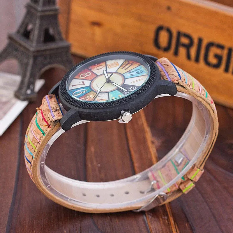 Women's vintage leather strap quartz watch with 37mm round dial and stainless steel buckle