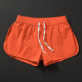 Men's loose-fitting orange polyester beach trousers for surfing and casual summer wear