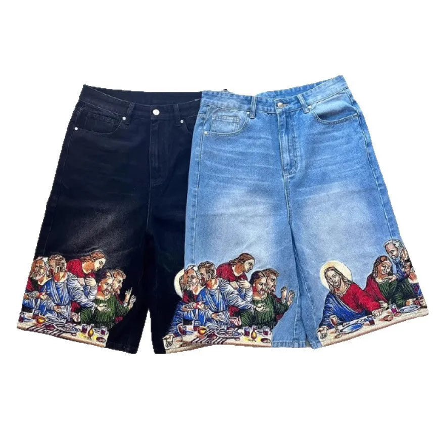 Men's blue cotton tapered shorts with Jesus print on back pocket, showing tapered leg design