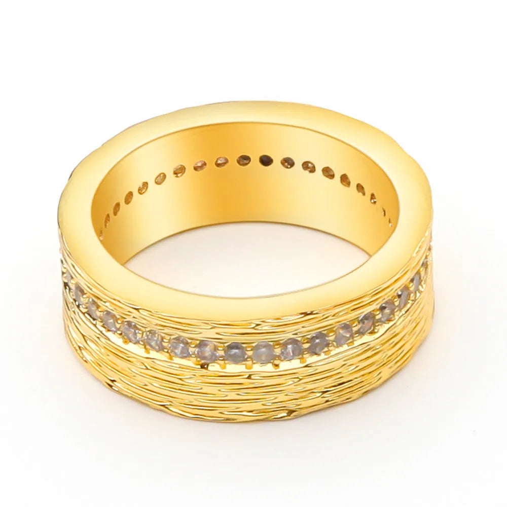 Gold geometric zircon ring for women on a white background.