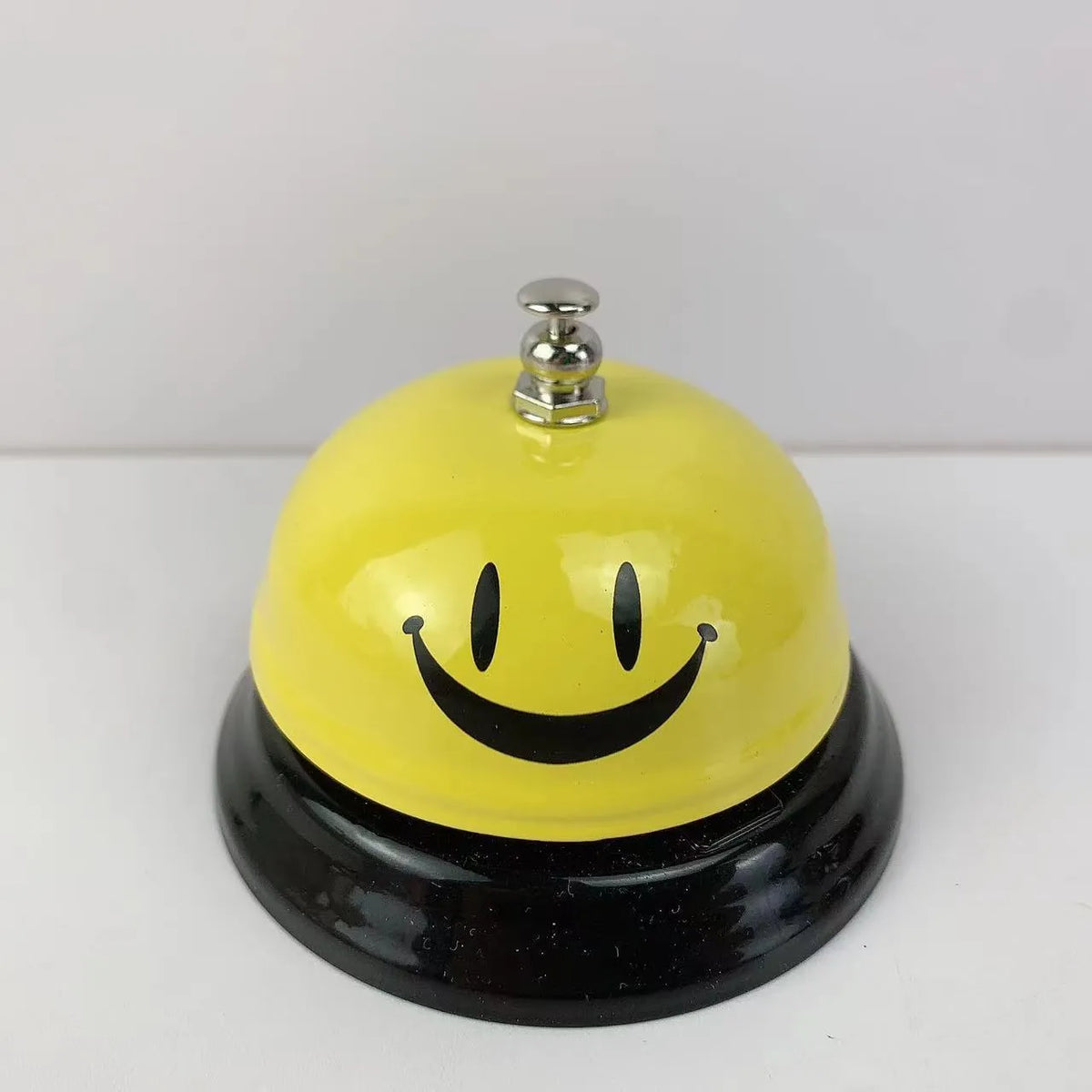 Iron hand bell for classrooms or restaurants in assorted colour options.