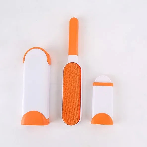 Blue reusable pet hair removal comb with a large double-sided sticky brush and a self-cleaning base unit.