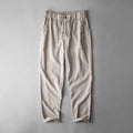 Men's linen casual trousers in solid colour with mid waist design and traditional trouser length