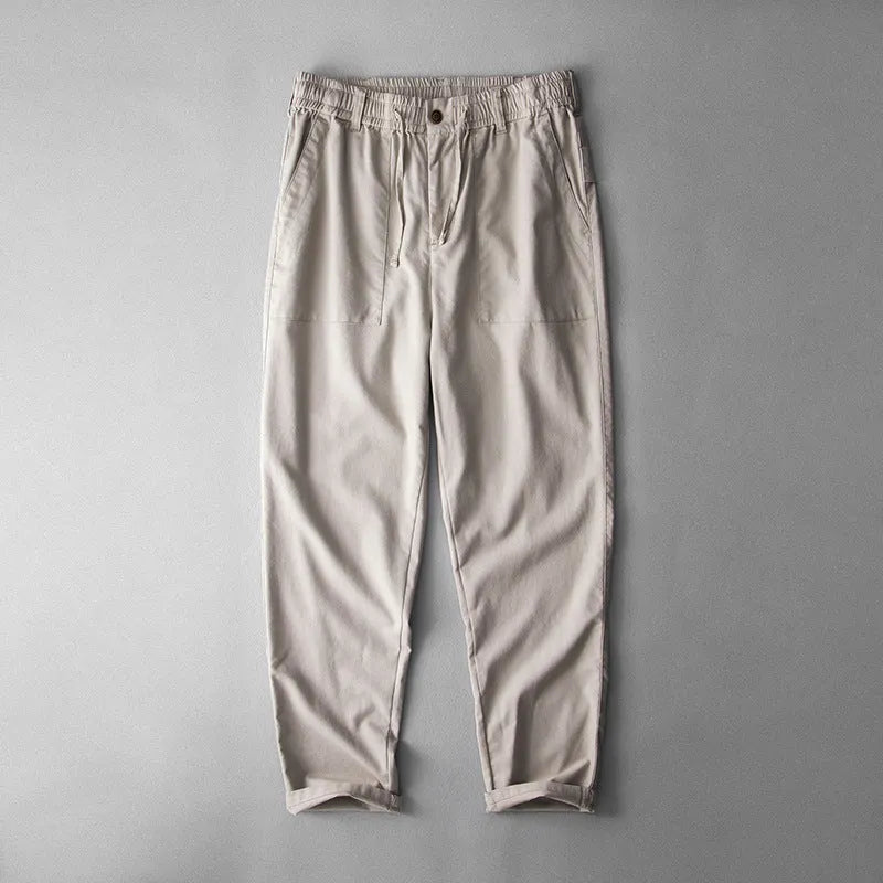 Men's linen casual trousers in solid colour with mid waist design and traditional trouser length