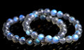 Natural Cream Body Blue Moonlight crystal bracelet with smooth ground beads.