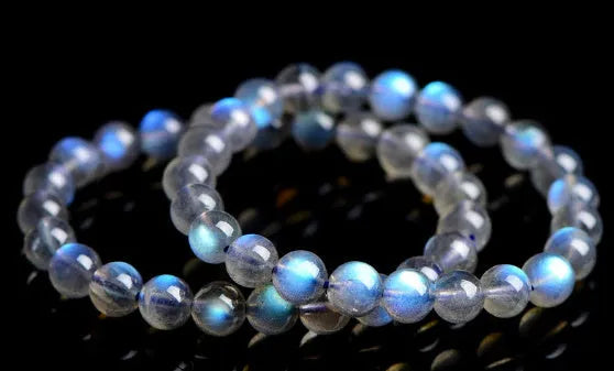 Natural Cream Body Blue Moonlight crystal bracelet with smooth ground beads.