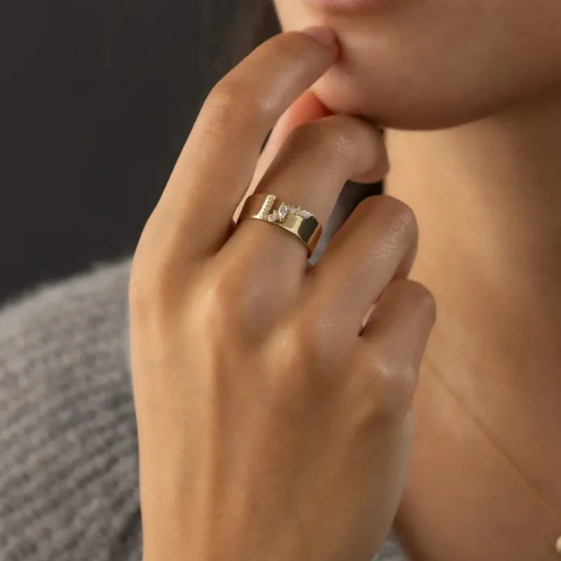 Gold colour zircon ring with electroplated finish on copper base, available in UK sizes 6-10