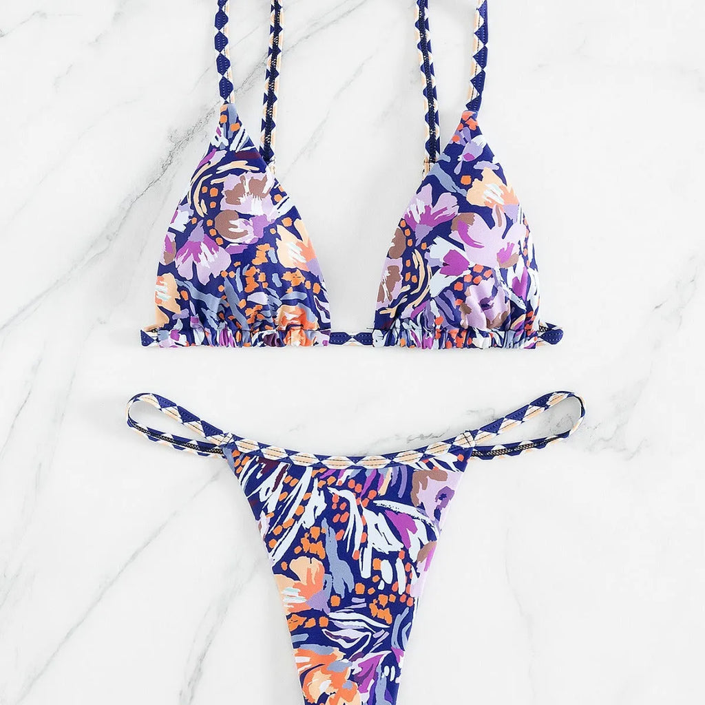 Women's floral print polyester swimsuit briefs on a white background.