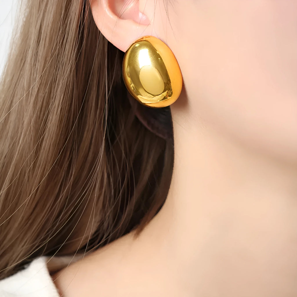 Geometric stainless steel ear studs with gold plating and glazed surface in DFE139 colour