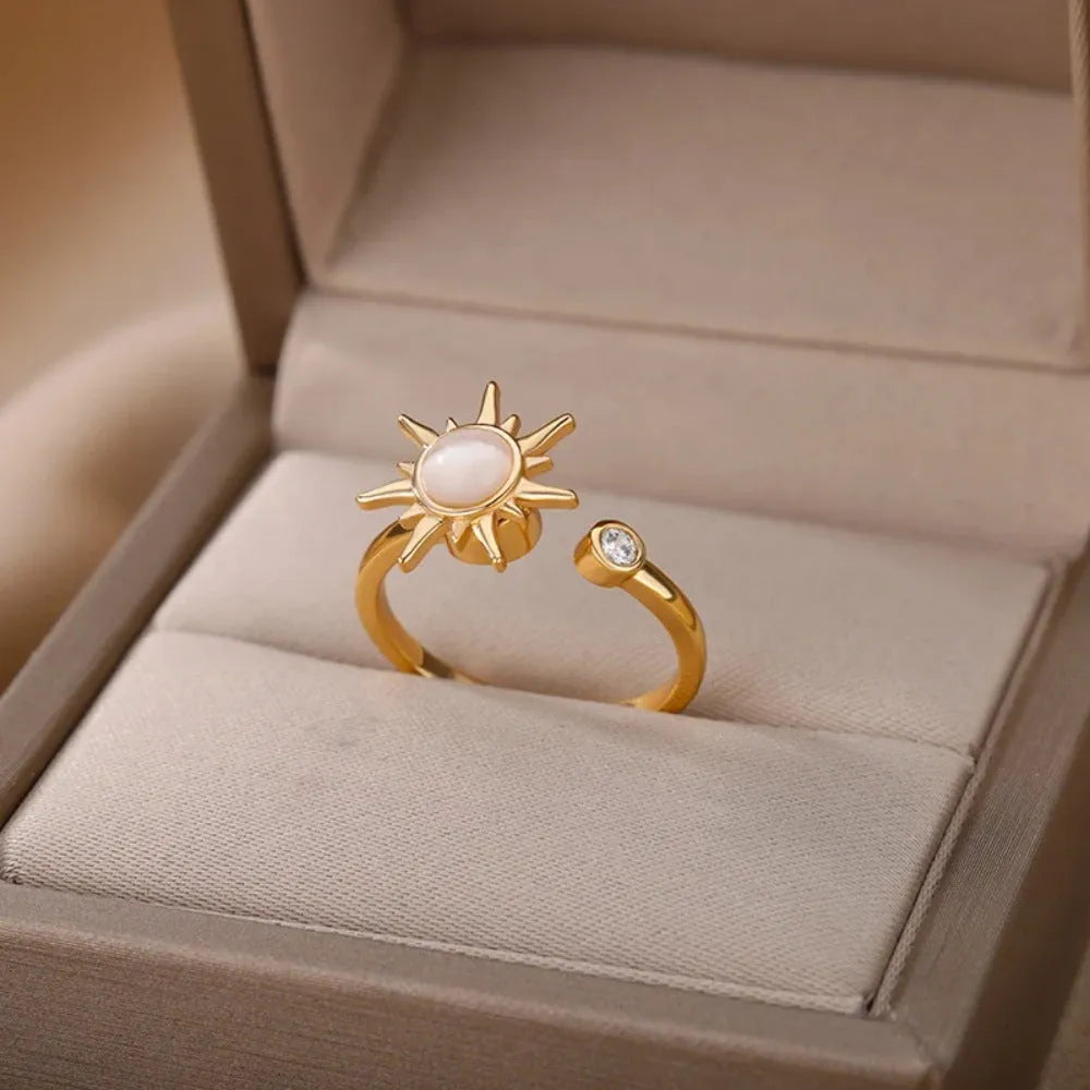 Gold and platinum electroplated copper decompression ring with rotatable design and adjustable opening