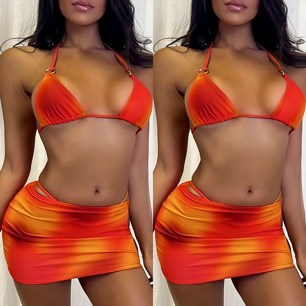 Tie-dye gradient halter bikini three-piece swimsuit set with top, pants, and skirt on a mannequin.