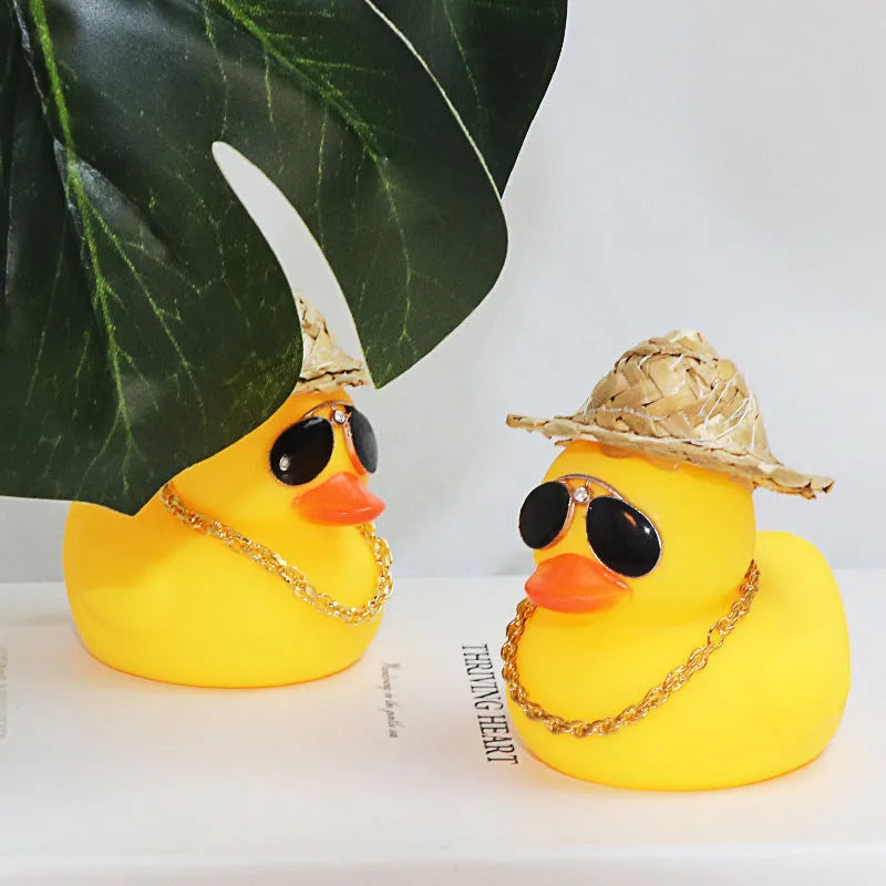 Straw hat yellow duck cartoon character car ornament with plastic alloy construction and accessory necklace