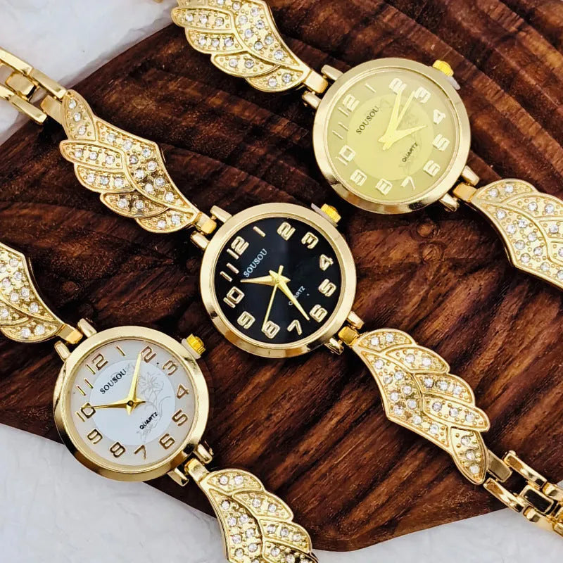 Women's stainless steel watch with round dial and vachette clasp, shown in gold colour.
